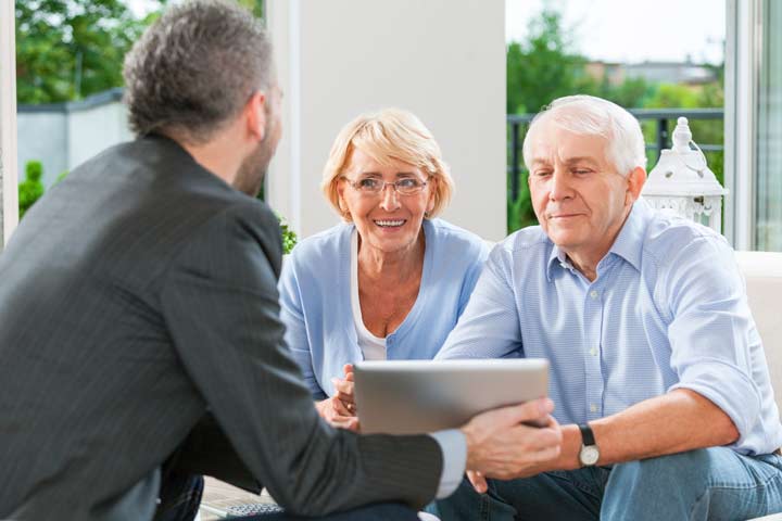 Attorney meeting with a client and family member